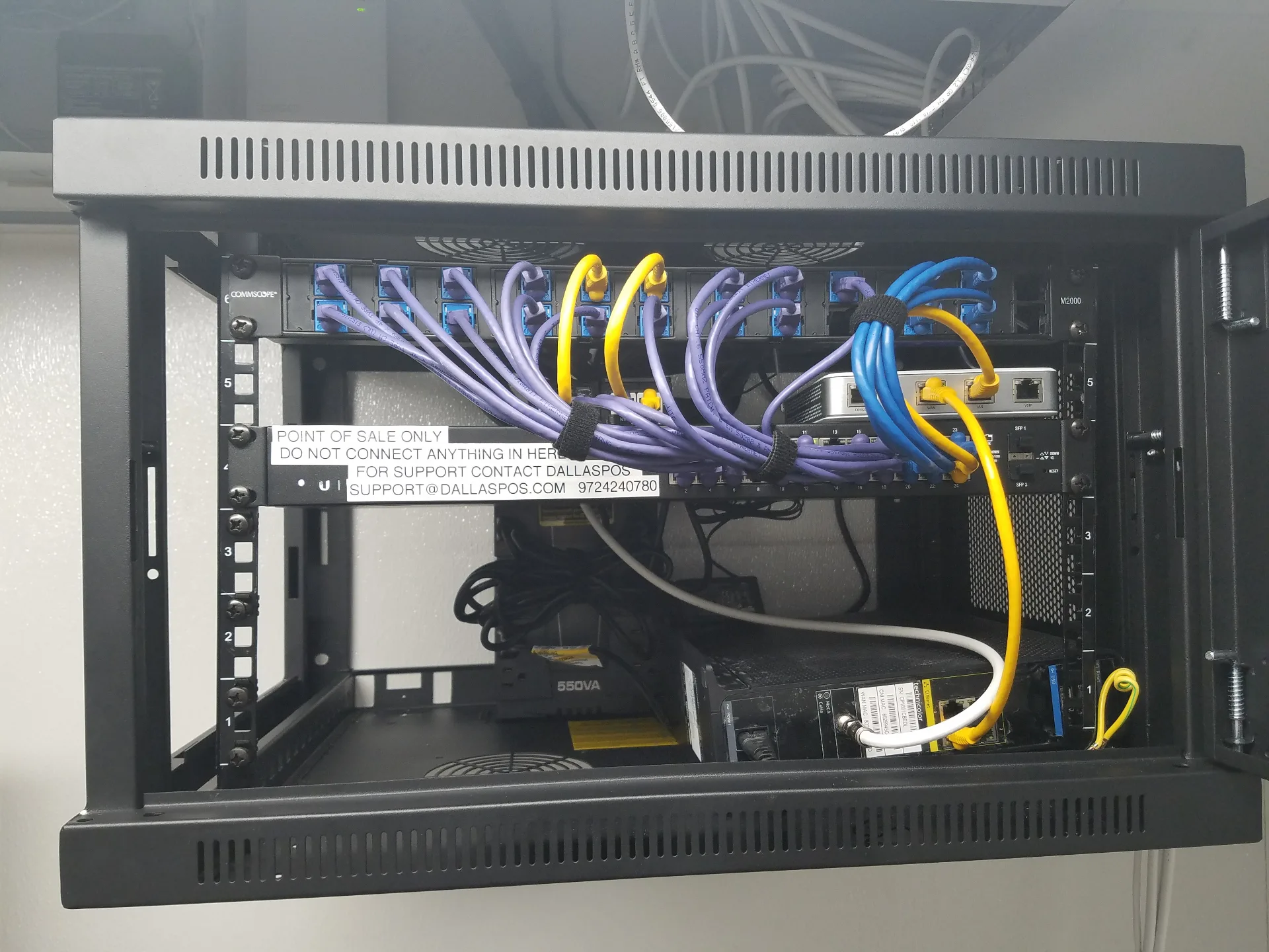 Wall-mounted network cabinet with patch panel