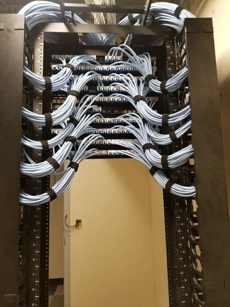 Rear cable management on patch panels